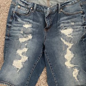 Torrid distressed shorts.  Bermuda length